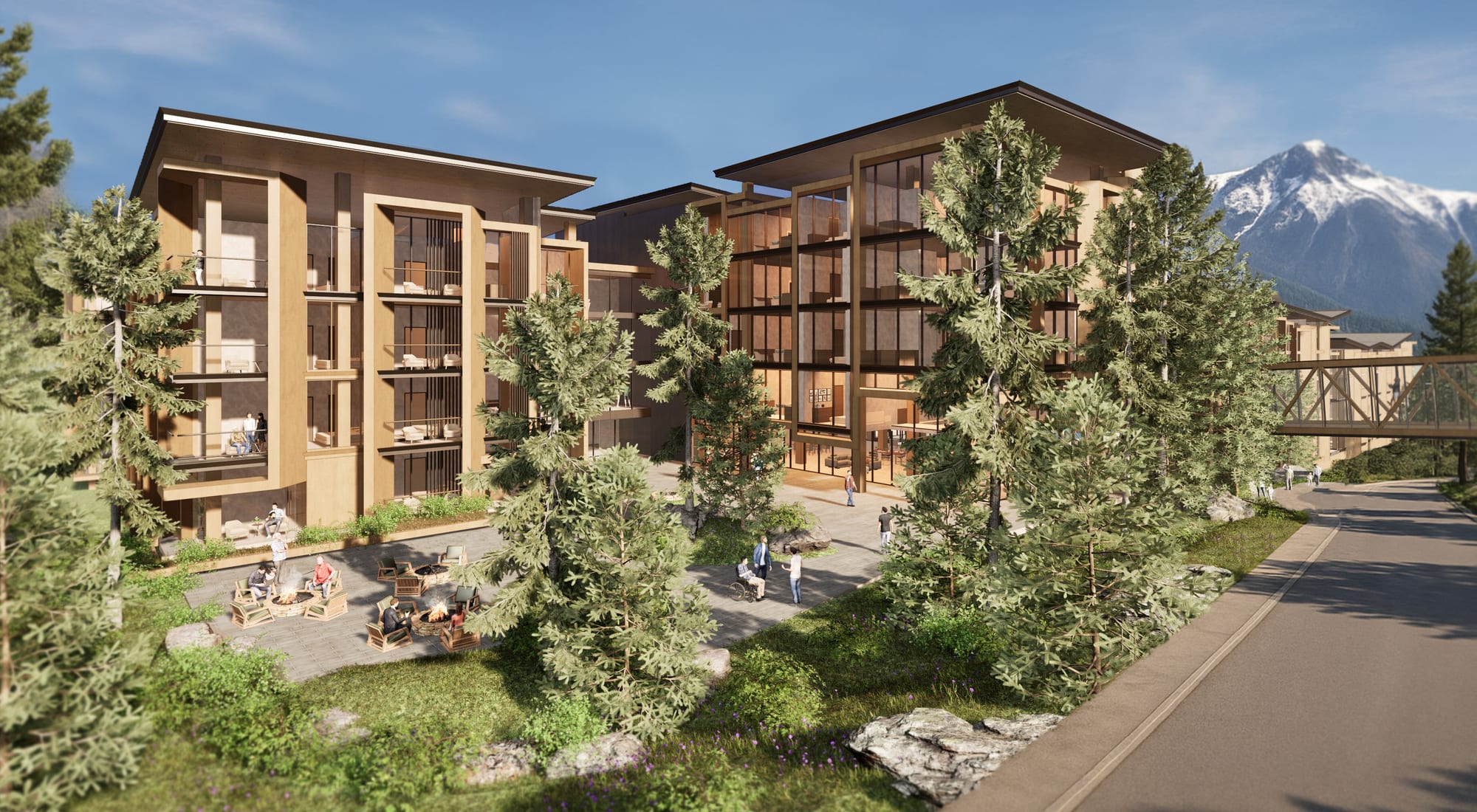 JW Marriott Residences, Mammoth – rendering of the Phase I luxury condominium development in Mammoth Lakes' North Village, with a courtyard and fire terrace among the pines and a Sierra peak beyond.