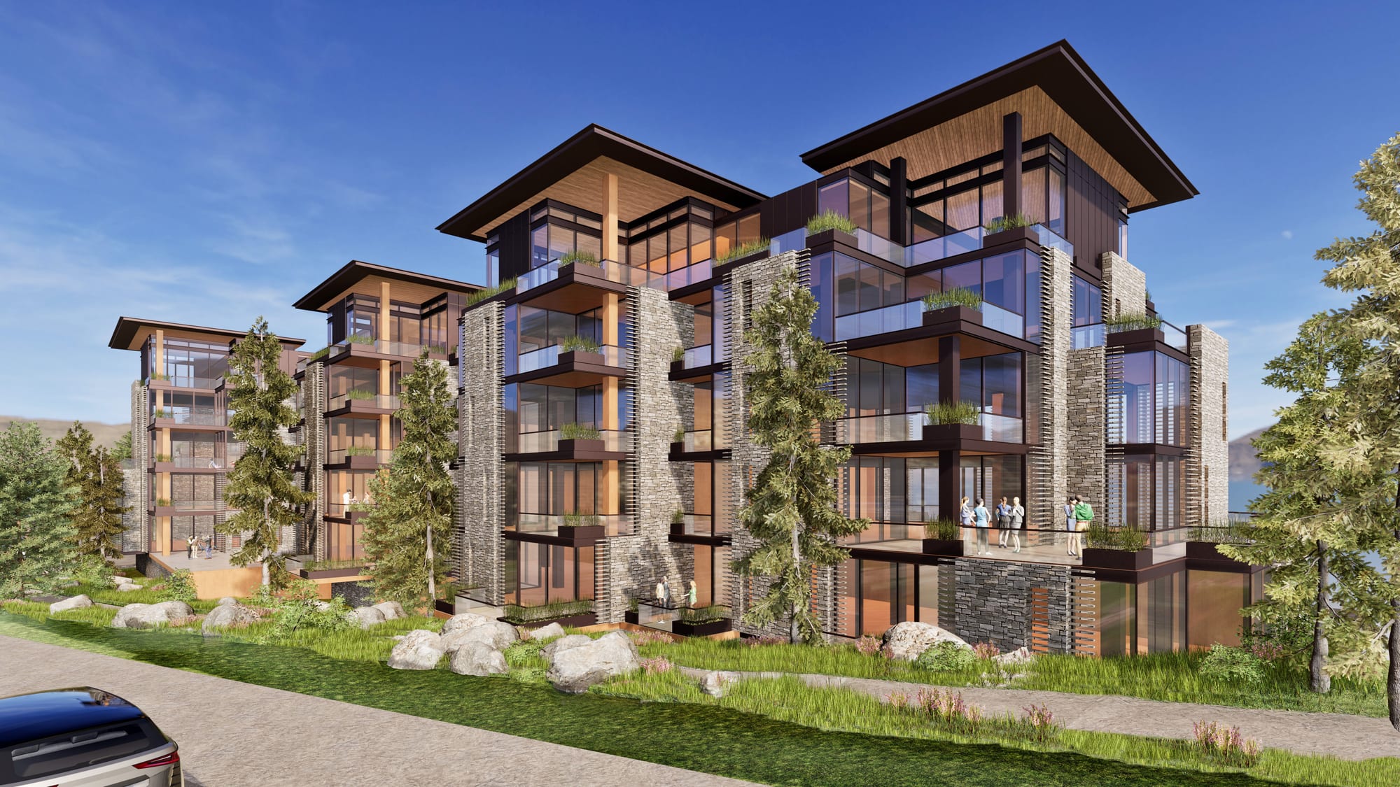 The Ritz-Carlton Residences, Mammoth – rendering of the Phase II stone-and-timber hillside residences in Mammoth Lakes' North Village, with the valley beyond.